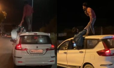 MP News : चलती कार पर युवकों ने किया खतरनाक स्टंट, ट्रैफिक नियमों की उड़ाई धज्जियां